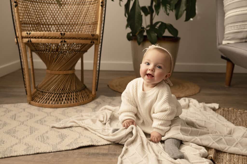 six month baby girl newton ks milestone photographer sitting on blanket